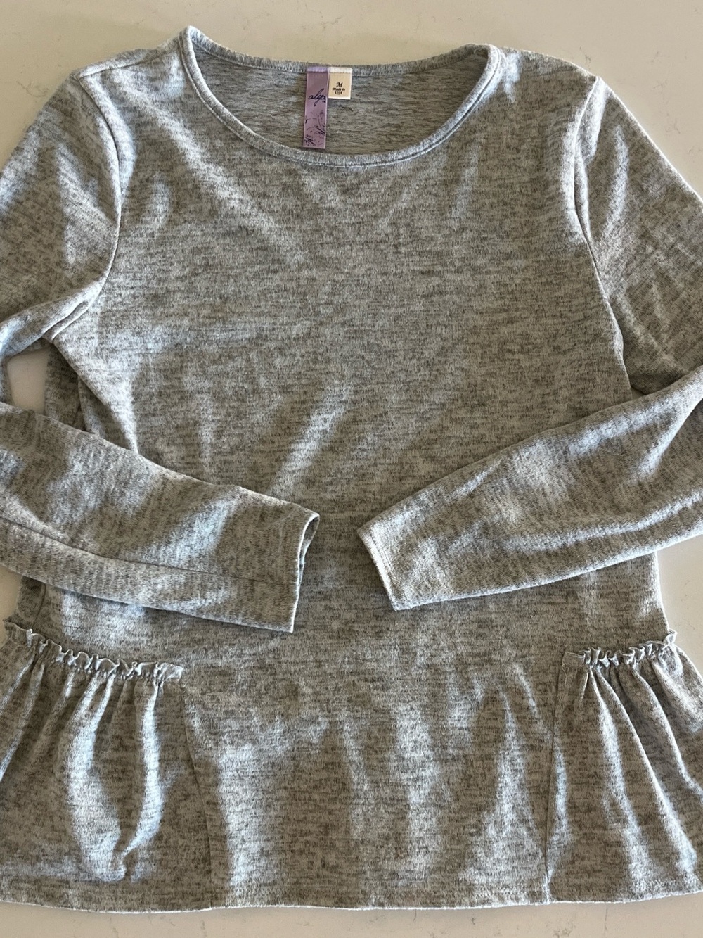 Gray Long-Sleeve Peplum Top ruffle hemline coquette